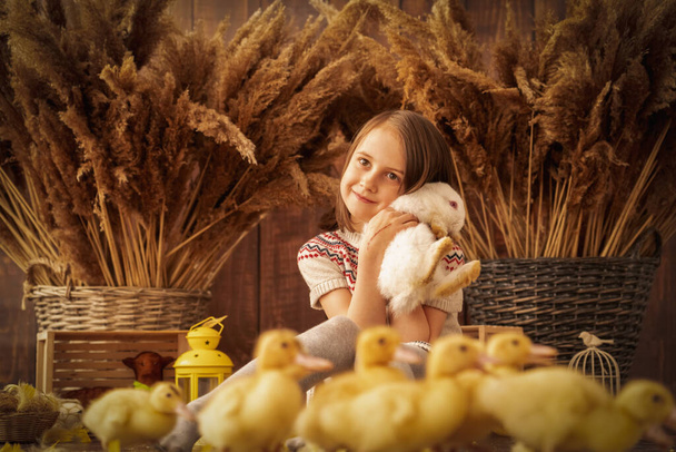 Easter portrait of hapy young beautiful girl with white rabbit.  - Zdjęcie, obraz