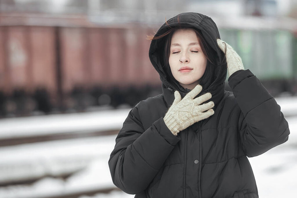 Portrait of a beautiful young woman in the winter season - Foto, Imagen