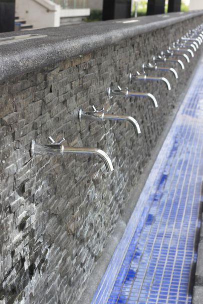 Row of taps in a mosque - Photo, Image