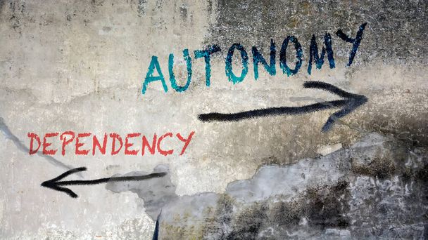 Street Allekirjoita suunta tapa Autonomia vs riippuvuus
 - Valokuva, kuva
