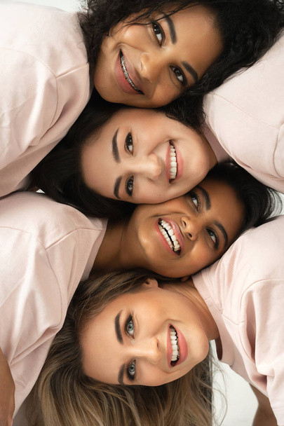 Group of different ethnicity women. Multicultural diversity and friendship. Female faces with different skin type and color. - Φωτογραφία, εικόνα
