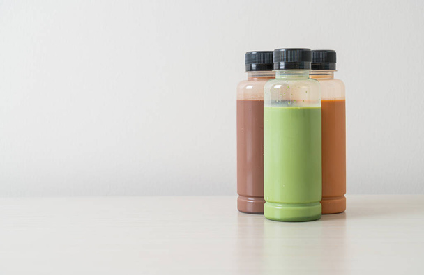 chocolate, Thai milk tea and Matcha green tea in plastic bottle packaging - Foto, Imagem