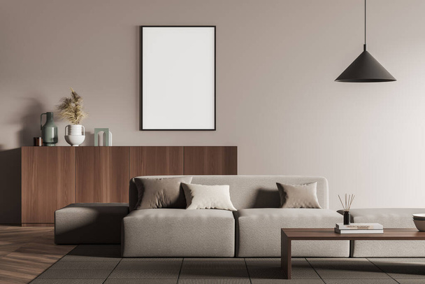 Living room interior with empty white framed mockup poster on wall, sofa, table, commode, hardwood flooring. Concept of minimalist design. Creative idea. Mock up. 3d rendering - Foto, Imagem