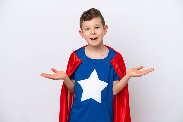 Super Hero little boy isolated on white background with shocked facial expression - Photo, image
