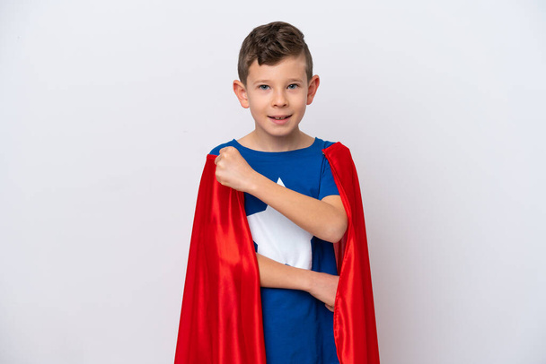 Super Hero little boy isolated on white background celebrating a victory - Photo, image