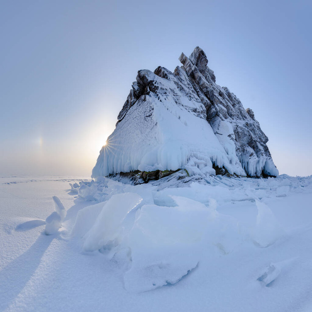 Elenka - Rock Island in the Baikal lake under ice and snow - Fotó, kép