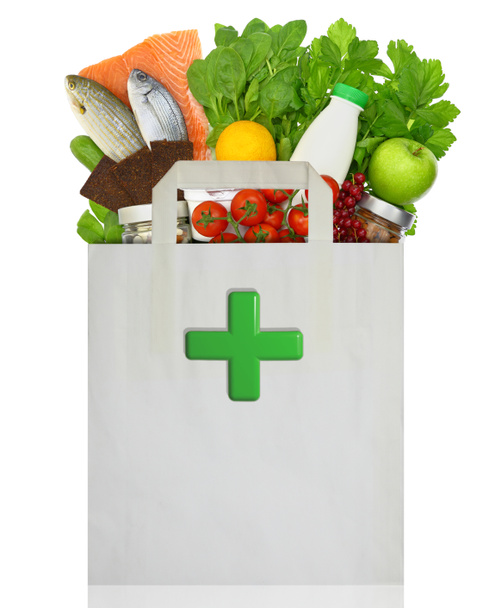Sac en papier avec croix verte médicale remplie d'aliments sains
 - Photo, image