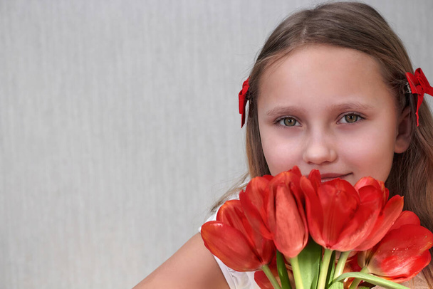 face beautiful girl portrait with flowers on monochrome background - Photo, Image