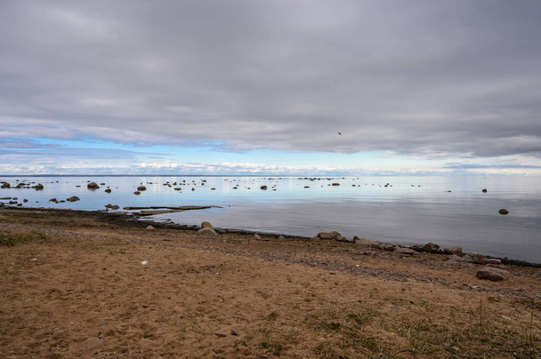granite boulders in the Gulf of Finland. cloudy gloomy day. - Photo, Image