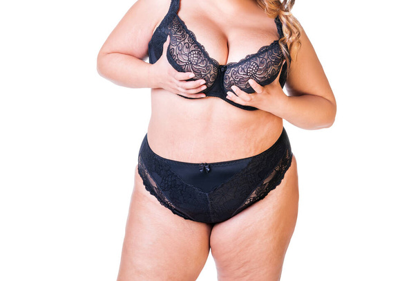 Sexy fat woman in black lingerie, overweight female body isolated on white background, plastic surgery concept - Photo, image