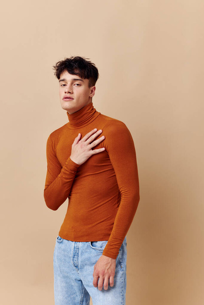 handsome guy posing in brown sweater self confidence fashion Lifestyle unaltered - Фото, изображение