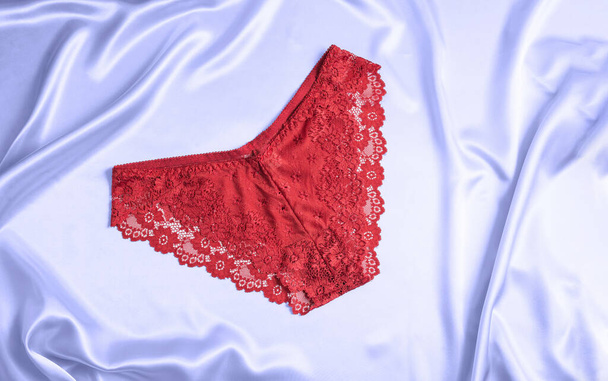 Women's lace panties background Fashion and space concept. - 写真・画像