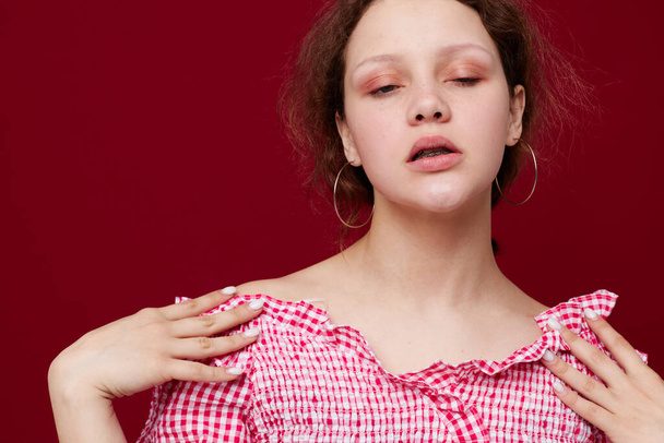 woman in pink blouse posing emotion gesture with hands - 写真・画像