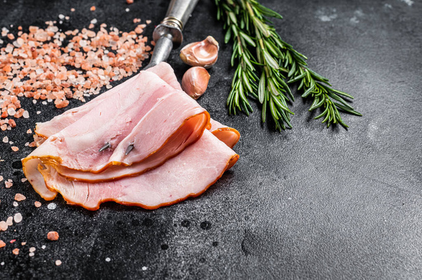 Sliced Ham from pork meat, Prosciutto cotto. Black background. Top view. Copy space - Photo, Image