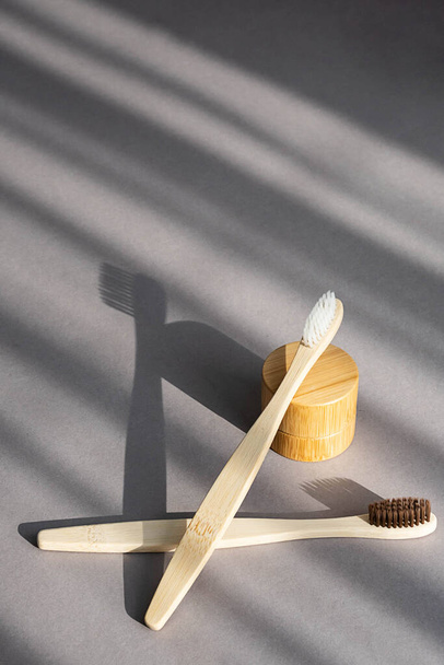 Natural zero waste bamboo toothbrushes. Toiletries, cosmetics for sustainable lifestyle. - 写真・画像