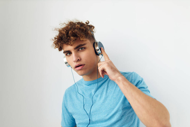 handsome guy in headphones music emotions Lifestyle unaltered - Foto, Imagem