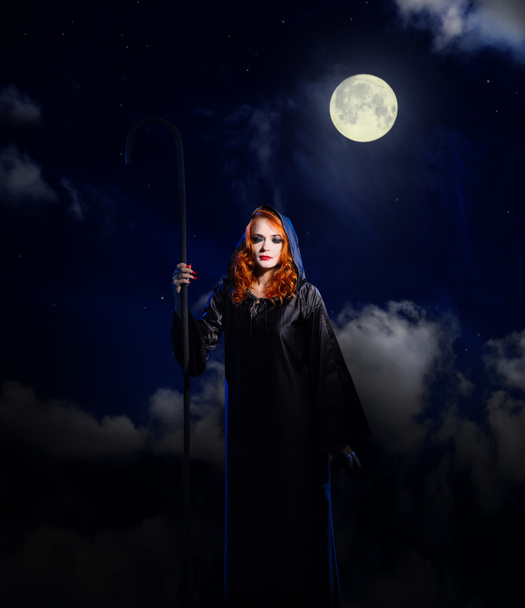 Witch on night sky background - Foto, Imagen
