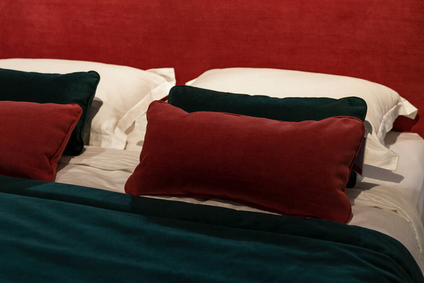 Pillows on a cozy bed. Interior design, decor and functionality. Close-up. - Fotoğraf, Görsel