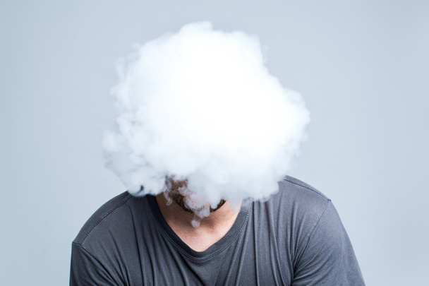 Face covered with thick smoke - Photo, Image