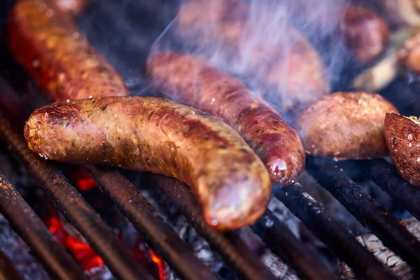 close up with homemade sausages on the grill. - Photo, Image