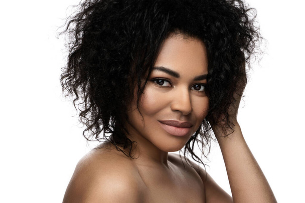 Portrait of young beautiful black woman with smooth skin on white background - Zdjęcie, obraz