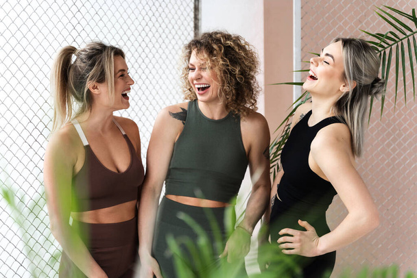 Group of happy sportive women wearing different sportswear - Photo, Image