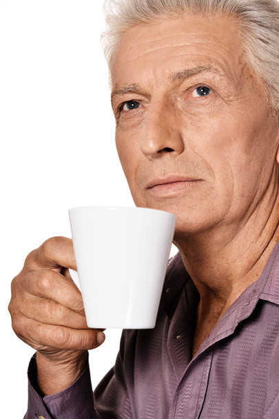 Elderly man with cup - Fotoğraf, Görsel