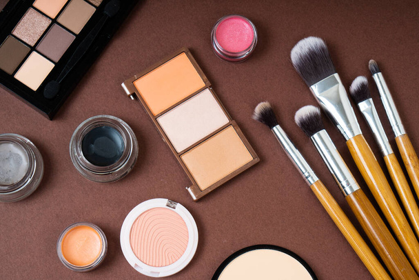 Group of cosmetic and makeup products on studio background - Foto, immagini