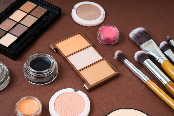 Group of cosmetic and makeup products on studio background - Photo, Image