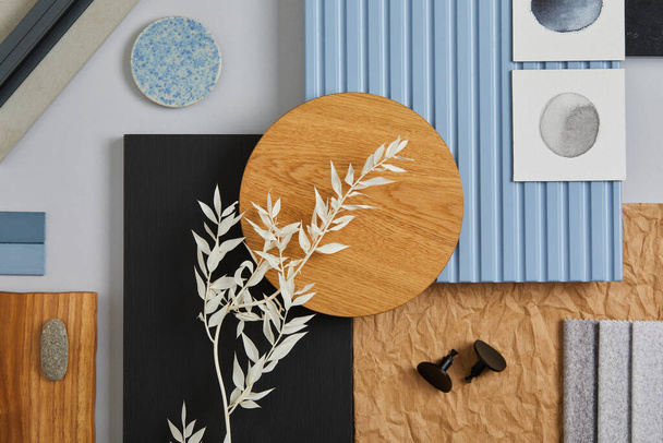 Flat lay of creative architect moodboard composition with samples of wood, textile, paint, lamella panels and tiles. Natural materials. Black, blue and light grey color palette. Copy space. Template. - Фото, изображение