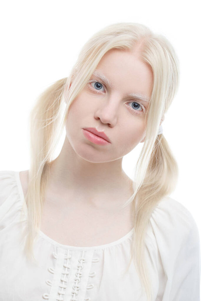 Gentle portrait of cute albino girl isolated on white background. - Photo, image