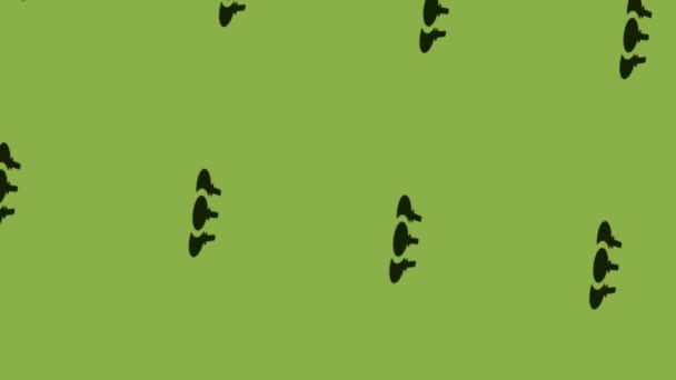 animation of festive balloons icon spinning on green background - Кадри, відео
