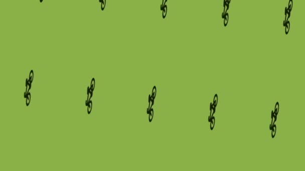 animation of spinning bicycle icon on green background - Footage, Video