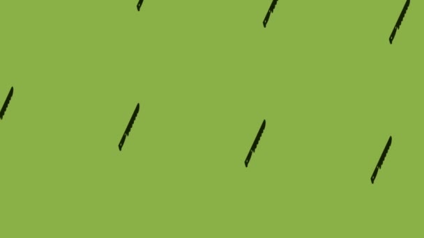 анимация вращения хлебного ножа на зеленом фоне - Кадры, видео