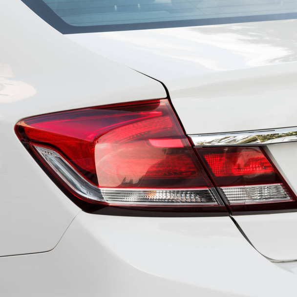 White car close-up detail. Back view with headlight - Zdjęcie, obraz