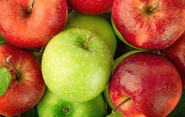 achtergrond van rode en groene appels - Foto, afbeelding