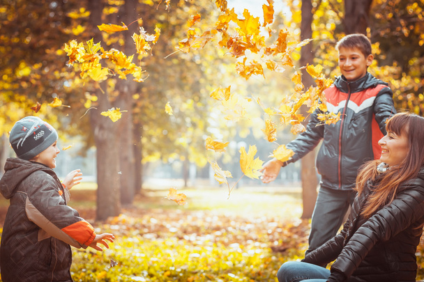 two brothers in autumn park - Foto, Imagen