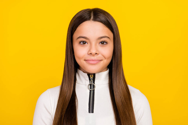 Photo of sweet charming preteen girl dressed white zipper shirt smiling isolated yellow color background - Foto, immagini
