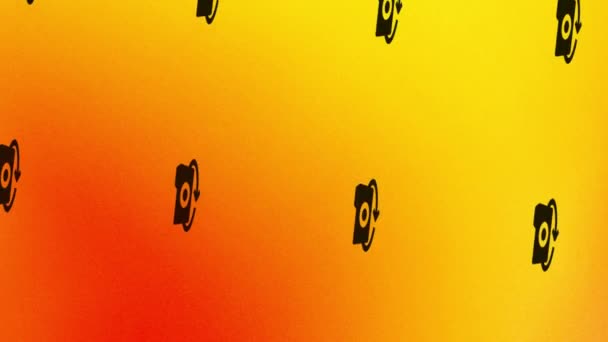 spinning photo camera with arrow icon animation on orange and yellow - Кадри, відео