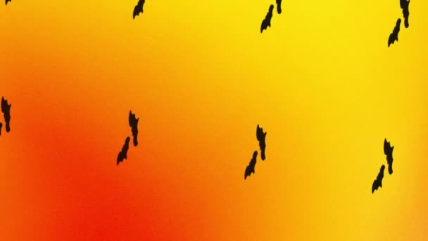 animazione di icona pipistrelli filatura su arancione e giallo - Filmati, video