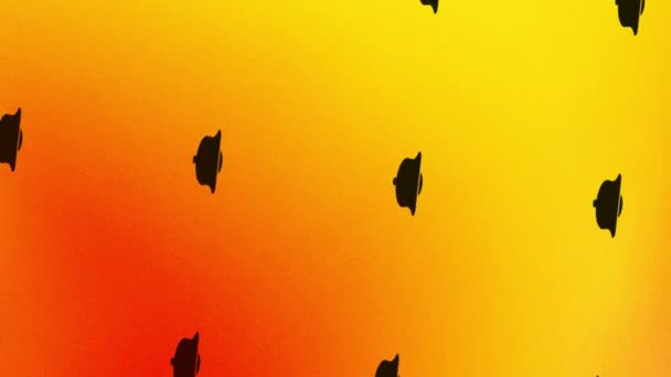 анимация черного вращающегося колокольчика на оранжевом и желтом - Кадры, видео