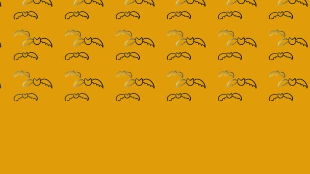 animacja ikony czarnych nietoperzy na żółto  - Materiał filmowy, wideo