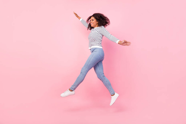 Full body profile portrait of pretty satisfied person look empty space isolated on pink color background - Fotografie, Obrázek