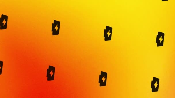 анимация значка батареи вращающегося аккумулятора на оранжевом и желтом - Кадры, видео
