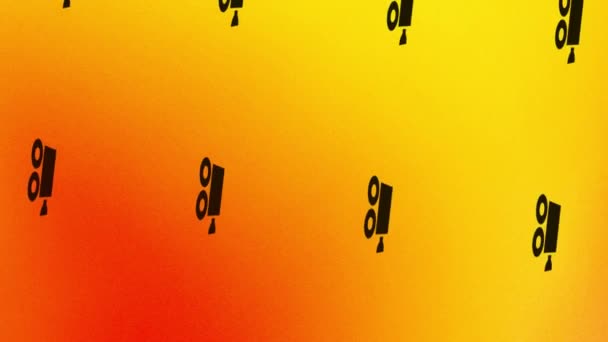 animazione di filatura icona della videocamera su arancione e giallo - Filmati, video