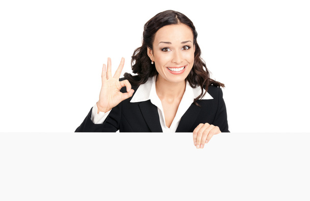 Businesswoman showing blank signboard, isolated - Photo, Image