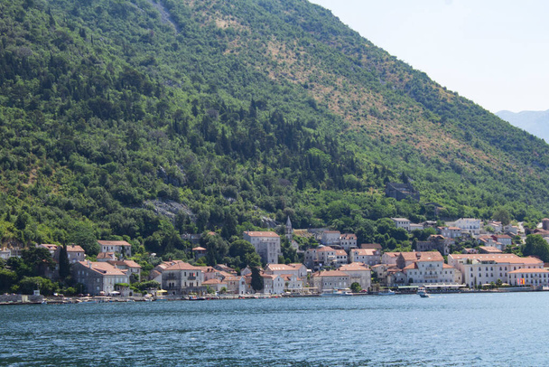 Panoramic view of the city and bay on the sunny day. Perast. Montenegro. - Foto, Imagen