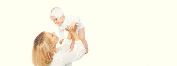Happy smiling mother and baby having fun together isolated on white background - Foto, imagen