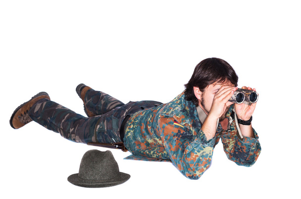 Hunter looking through binoculars - Foto, Imagen