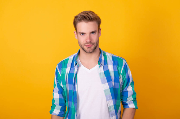 Seriously handsome. Regular guy portrait. Handsome guy yellow background. Young man - Foto, Imagem